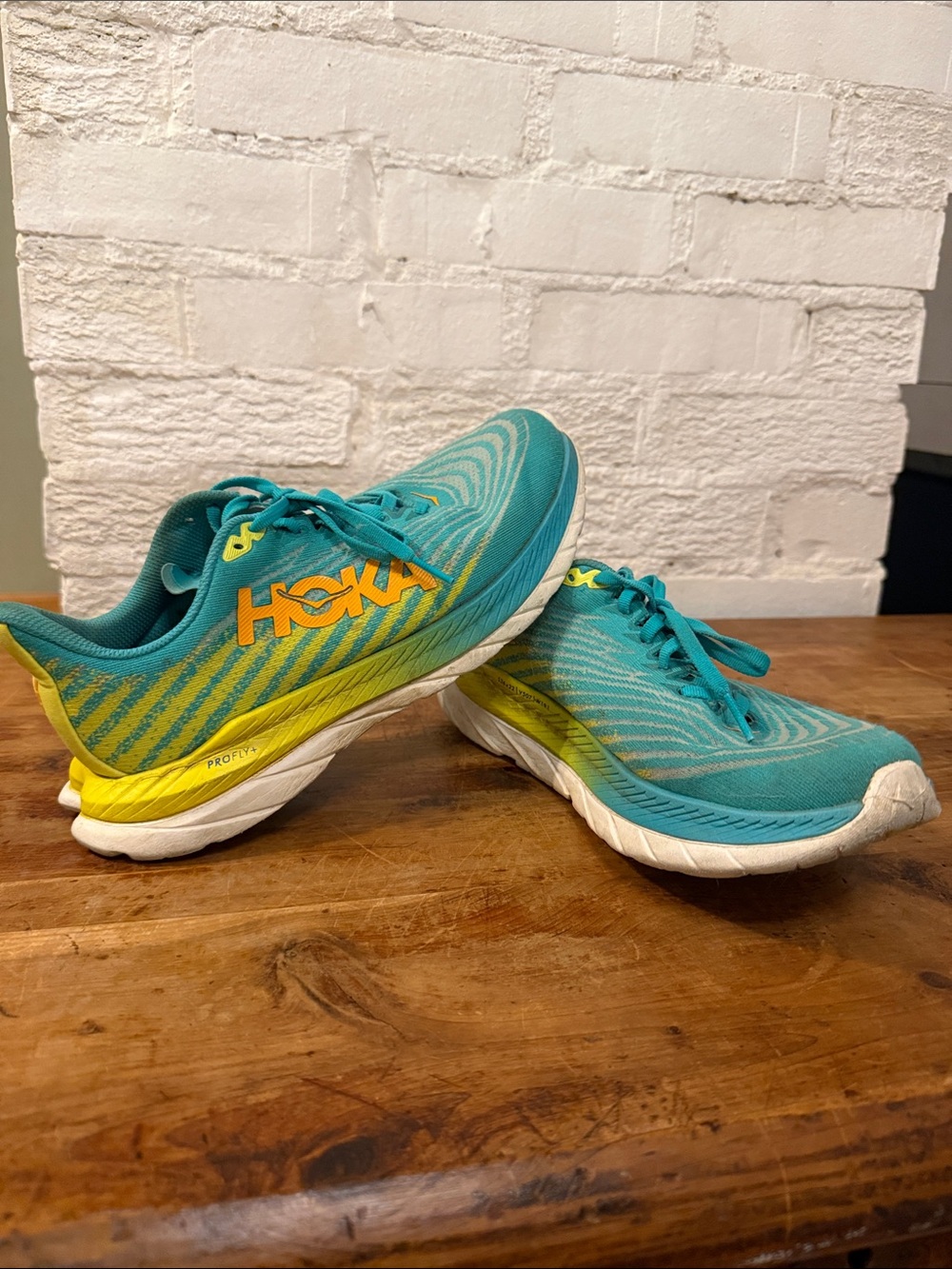 Hoka Women's Teal and Yellow Performance Running Shoes